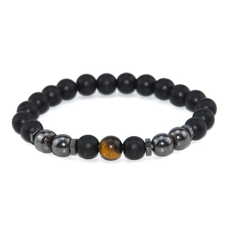 Elegant beaded bracelet featuring black magnet design with garnet stones, suitable for both men and women.