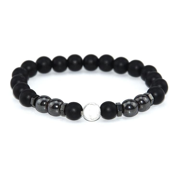 Elegant beaded bracelet featuring black magnet design with garnet stones, suitable for both men and women.
