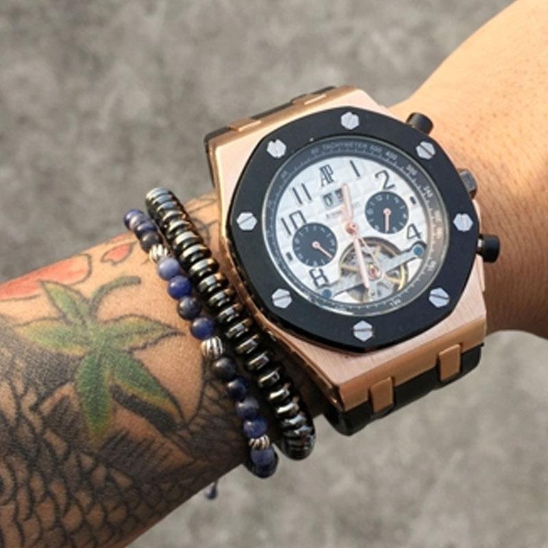 Men's 6mm hematite bracelet woven with nylon rope and red agate stones, showcasing a stylish and modern design.