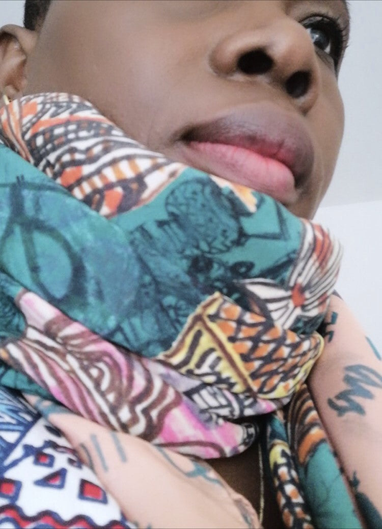 Beautiful Nostalgia Crepe de Chine Scarf featuring clay pots and Adinkra symbols, showcasing vibrant colors and luxurious fabric.