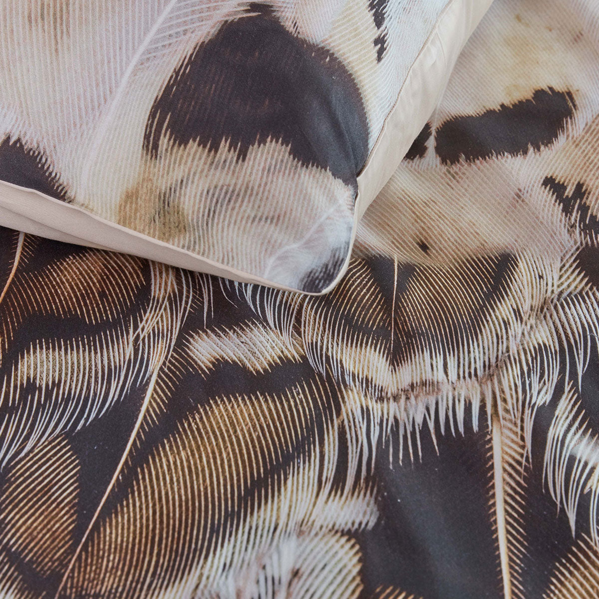 Bedding House Giselle Natural Cotton Sateen Quilt Cover Set featuring a vibrant feather print in multiple colors on a queen-sized quilt cover.