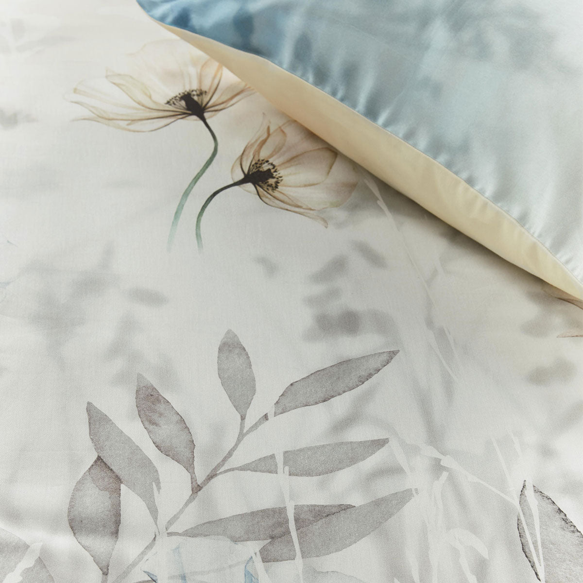 Bedding House Isabelle Light Blue Cotton Sateen Quilt Cover Set featuring floral print design and soft hues, perfect for a queen-sized bed.