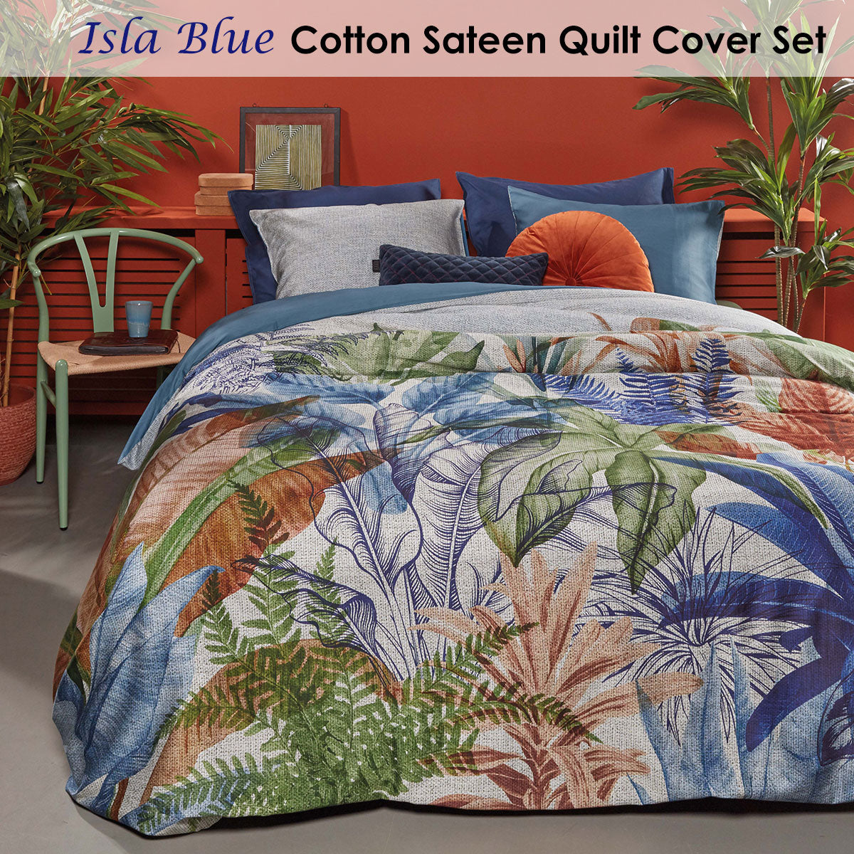 Isla Blue Cotton Sateen Quilt Cover Set featuring tropical foliage print in vibrant colors, with a soft blue backing.