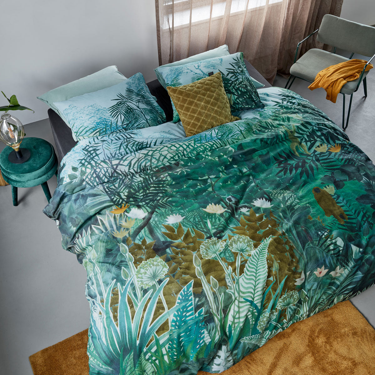 Madagascar Green Cotton Quilt Cover Set featuring a leafy design with monkeys and tropical flowers, perfect for king-sized beds.