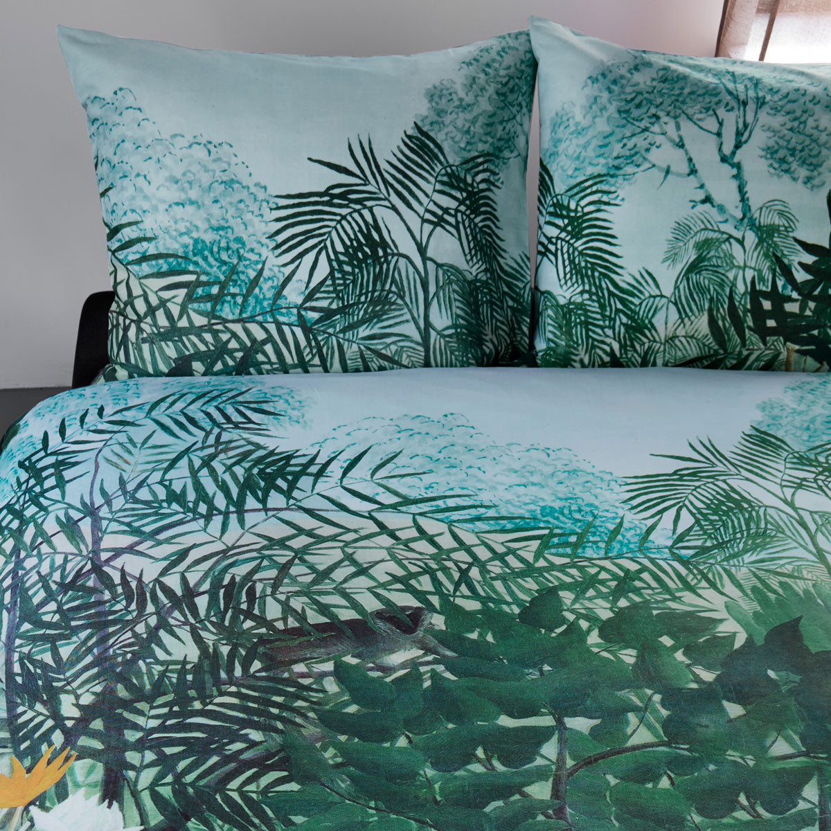 Madagascar Green Cotton Quilt Cover Set featuring a vibrant foliage print with tropical flowers and hidden monkeys, perfect for queen-sized beds.