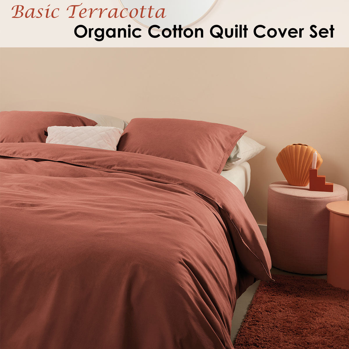 Bedding House Organic Cotton Basic Terracotta Quilt Cover Set featuring a quilt cover and two pillowcases in a warm terracotta color.