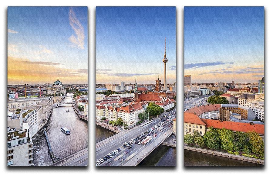 A stunning 3-panel canvas print featuring the Berlin skyline over the Spree River, showcasing vibrant colors and intricate details.