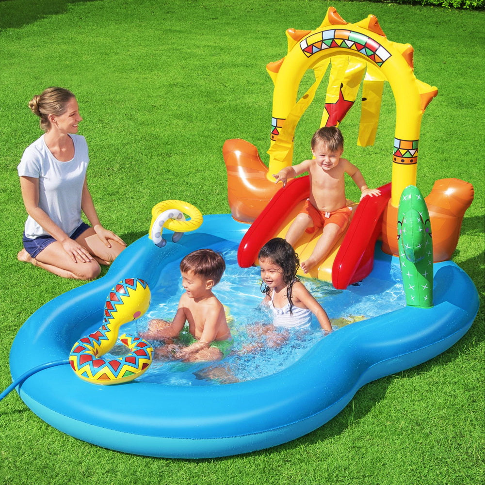 Bestway Wild West Swimming Pool featuring inflatable horse, slide, and built-in sprinkler for kids' outdoor fun.