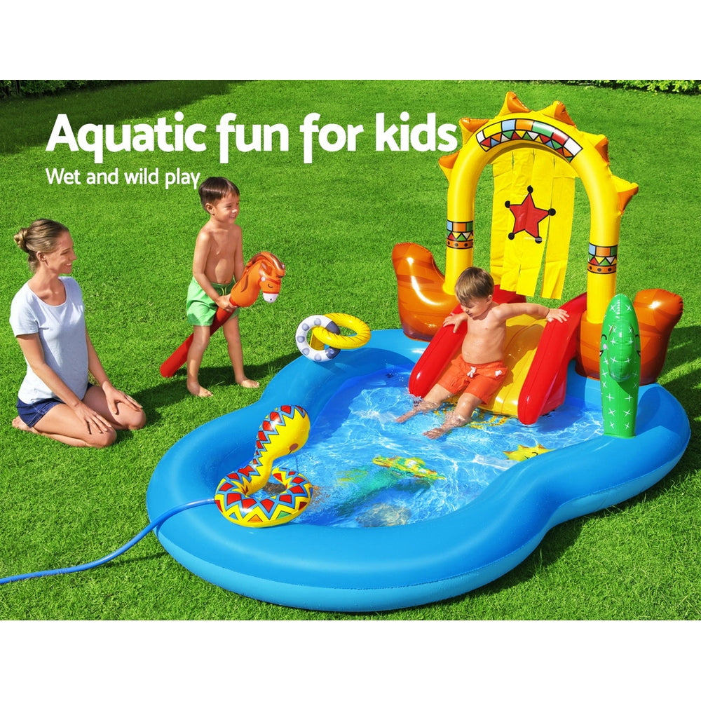 Bestway Wild West Swimming Pool featuring inflatable horse, slide, and built-in sprinkler for kids' outdoor fun.