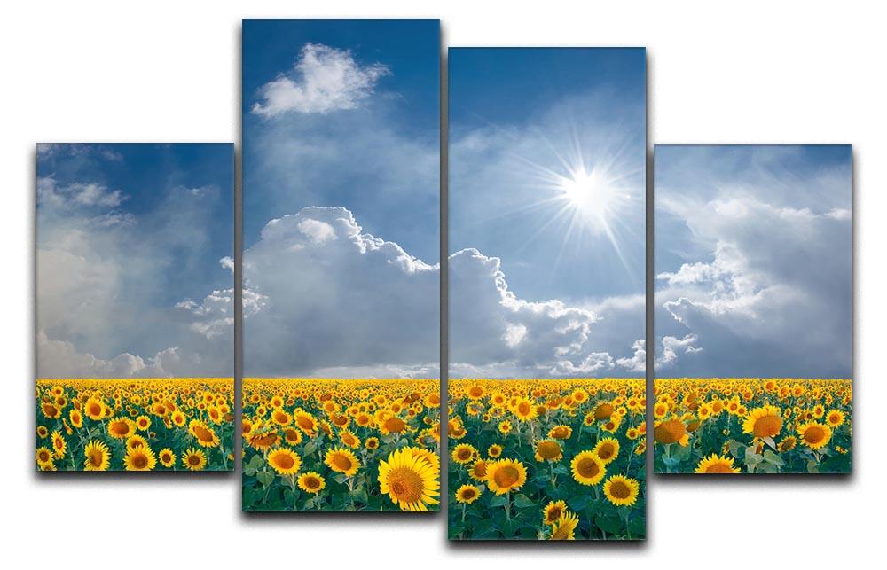 A vibrant 4-panel canvas artwork featuring a field of sunflowers under a bright blue sky, showcasing nature's beauty.