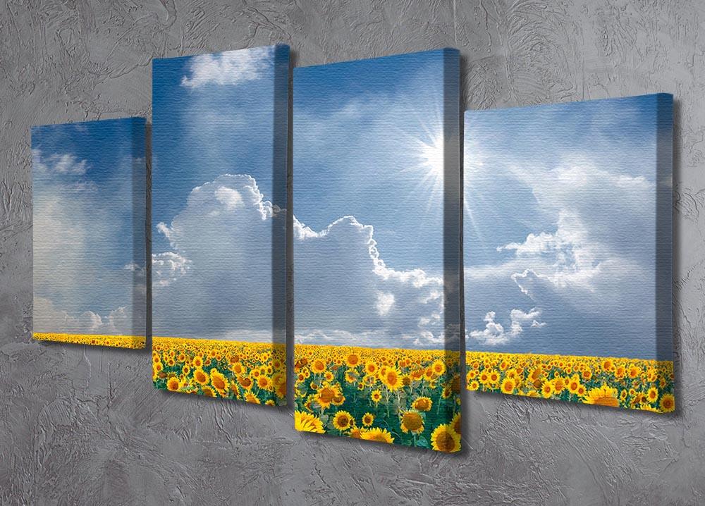 A vibrant 4-panel canvas artwork featuring a field of sunflowers under a bright blue sky, showcasing nature's beauty.