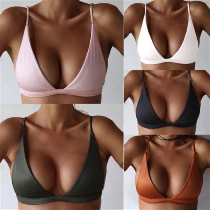 A stylish solid color bikini top for women, featuring a push-up design and high waist fit, perfect for summer beach outings.