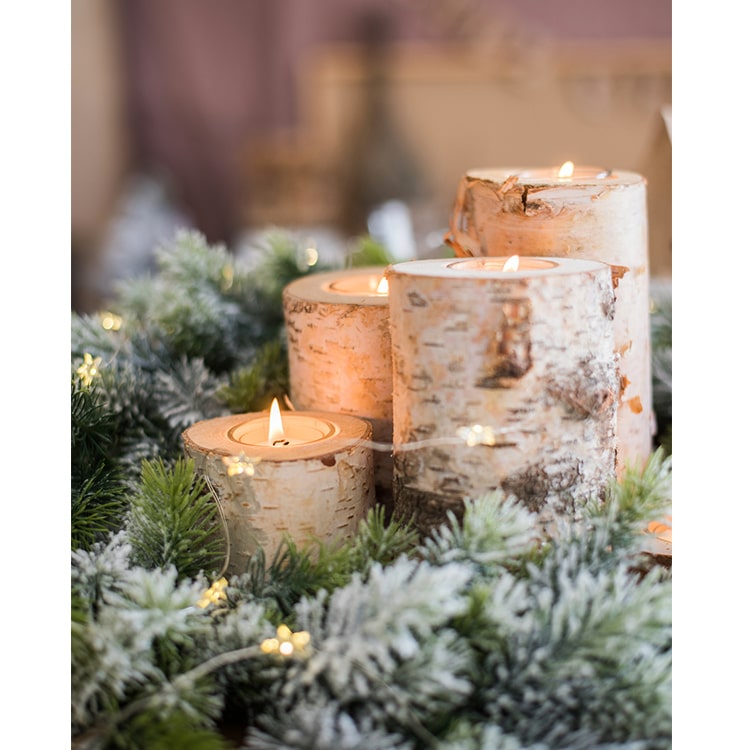 Birch wood candle holder for tea lights, showcasing natural wood grain and available in various sizes.