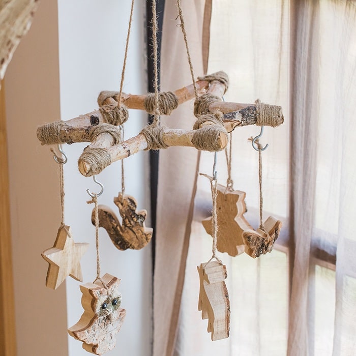 Birch Wood Craft Decorative Wind Chime Hanger with hemp rope, showcasing its natural khaki color and handcrafted design.