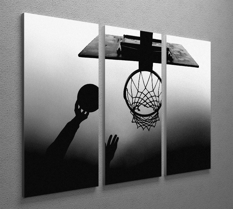 Black and white canvas print featuring a basketball hoop, displayed in three split panels, enhancing modern decor.