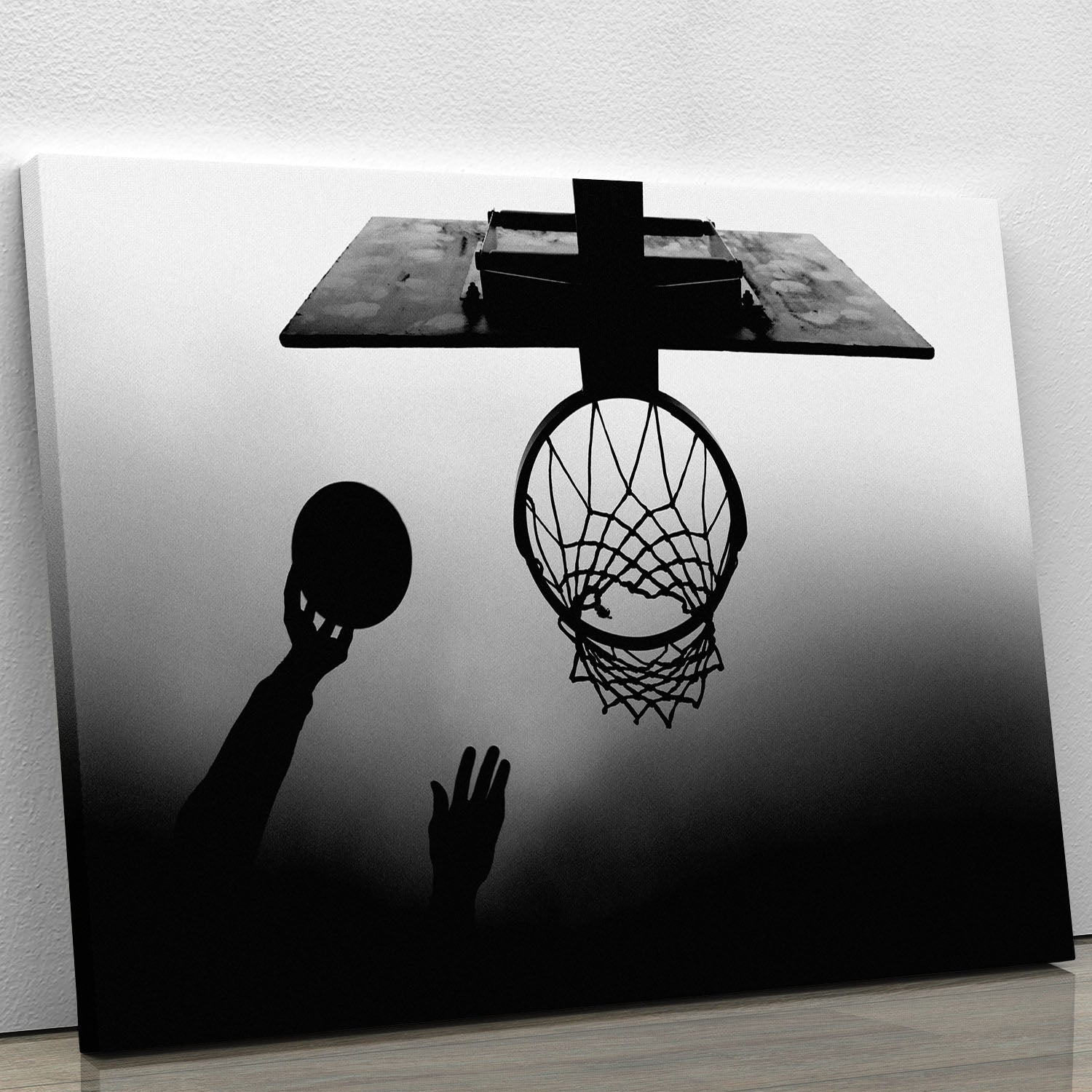 Black and white canvas print featuring a basketball hoop, showcasing a minimalist design perfect for sports enthusiasts.