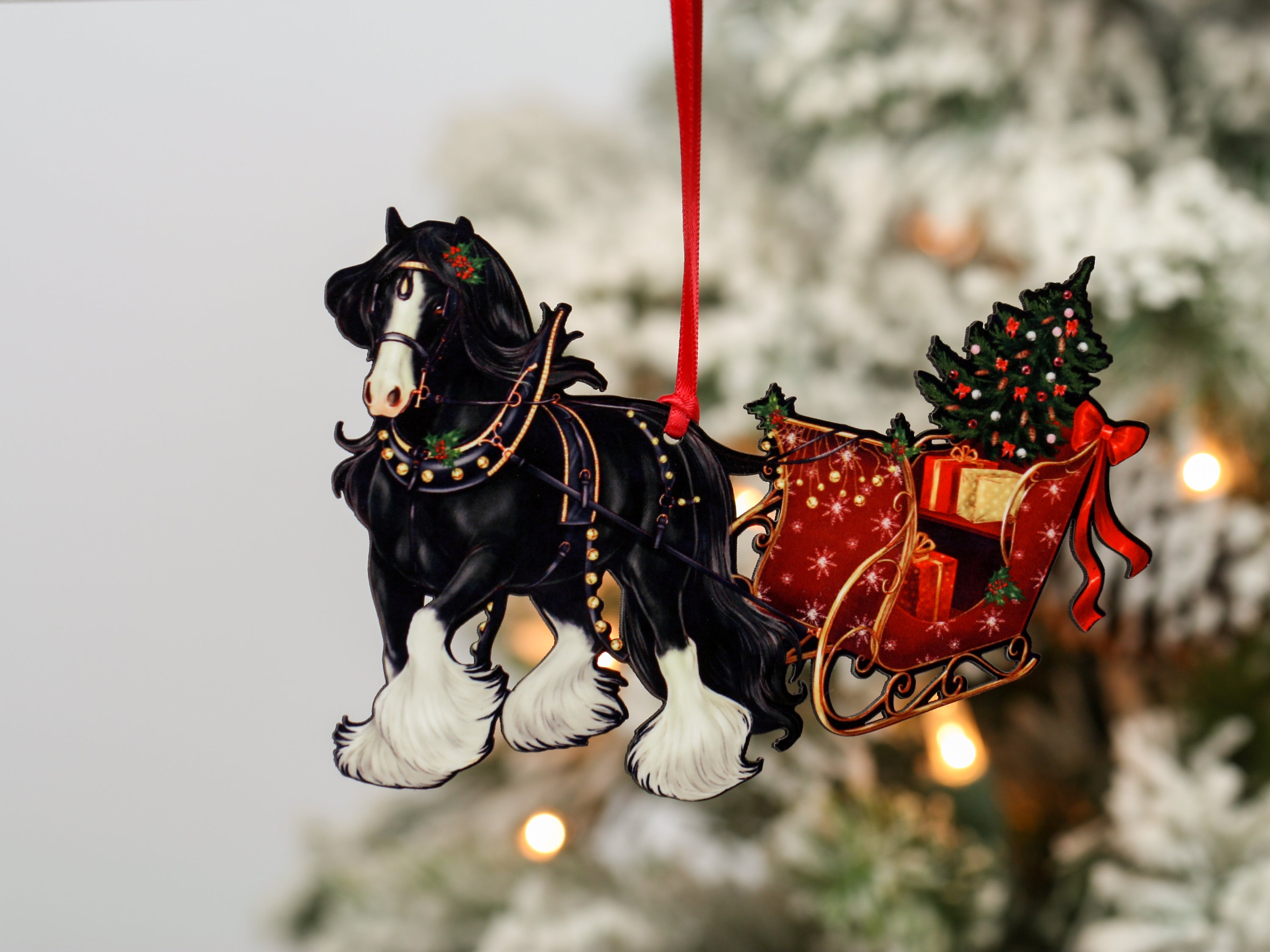 Black Gypsy Cob Horse Christmas Ornament with sleigh, handmade from composite wood, featuring a glossy front and dark brown back.