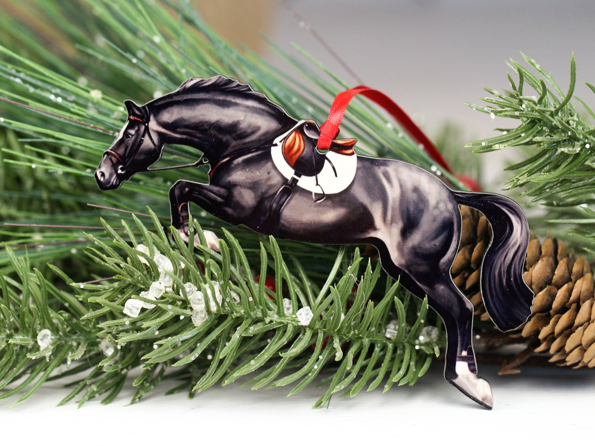 Elegant Black Hunter Jumper Horse Ornament with black and red ribbons, handmade from composite wood, perfect for equestrian decor.