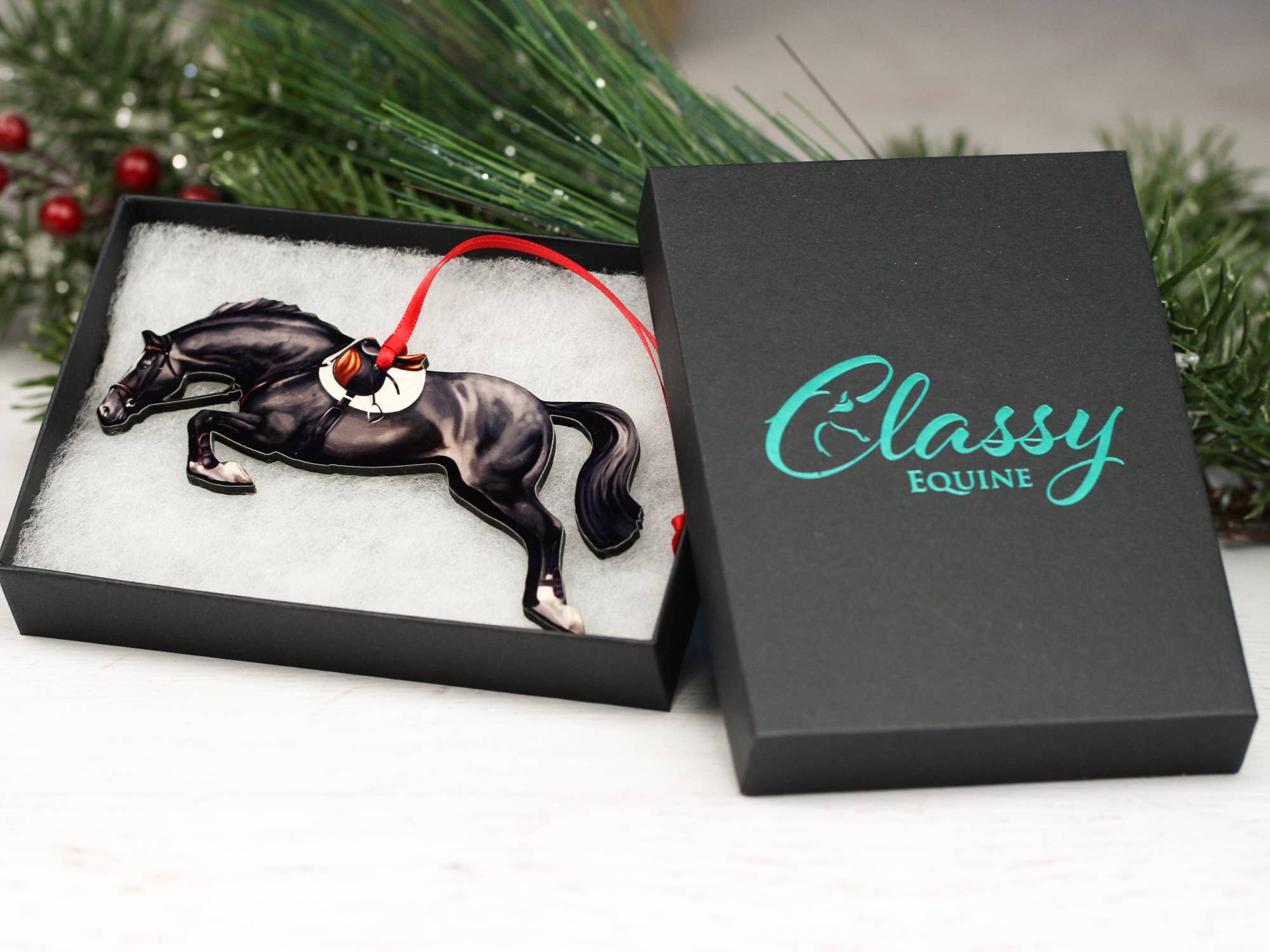 Elegant Black Hunter Jumper Horse Ornament with black and red ribbons, handmade from composite wood, perfect for equestrian decor.