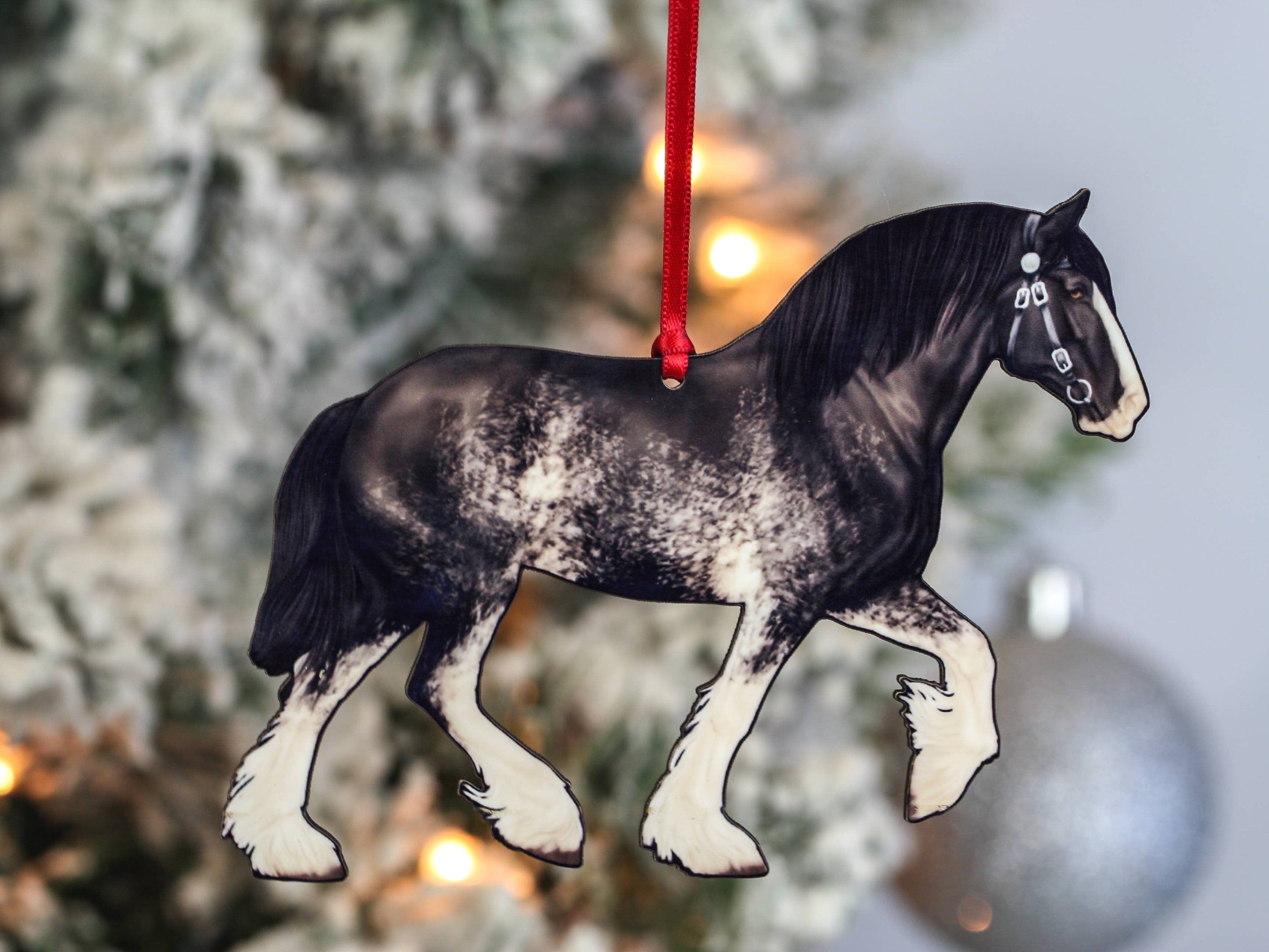Black Sabino Shire Horse Christmas Ornament with red and black ribbons, handcrafted from composite wood, featuring glossy artwork.