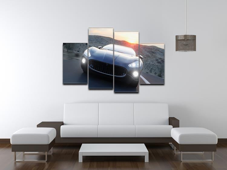 A striking black sport car displayed across four split canvas panels, creating a dynamic and modern art piece.