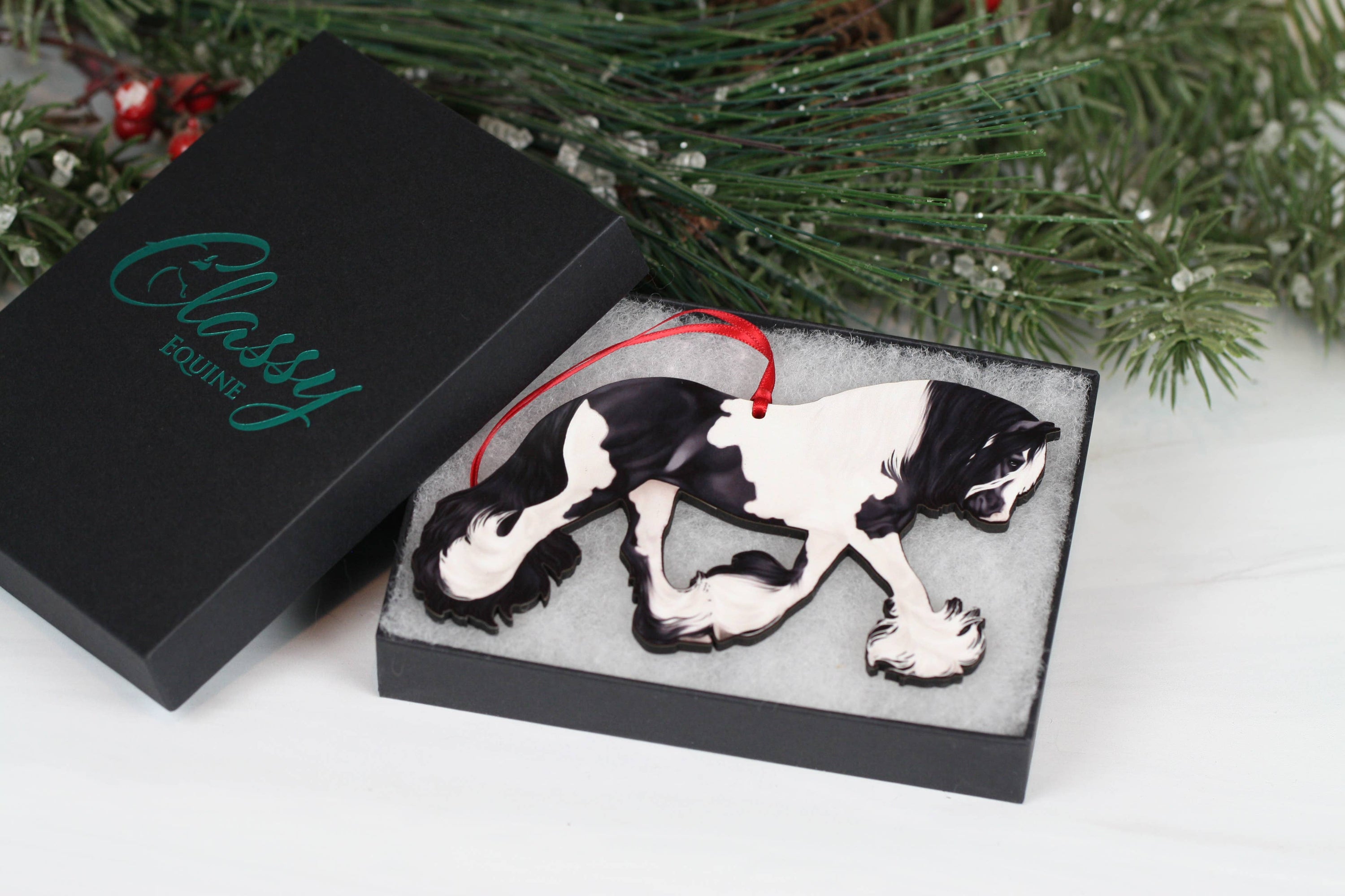 Black Tobiano Gypsy Cob Horse ornament made from composite wood, featuring a glossy front and dark brown back, perfect for holiday decorations.