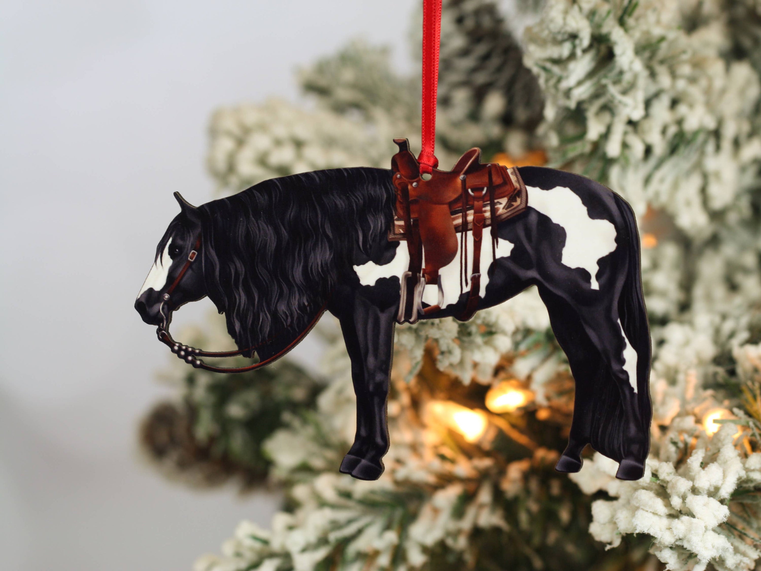 Black and white tobiano western Paint Horse ornament, handmade from composite wood, perfect for Christmas decor.