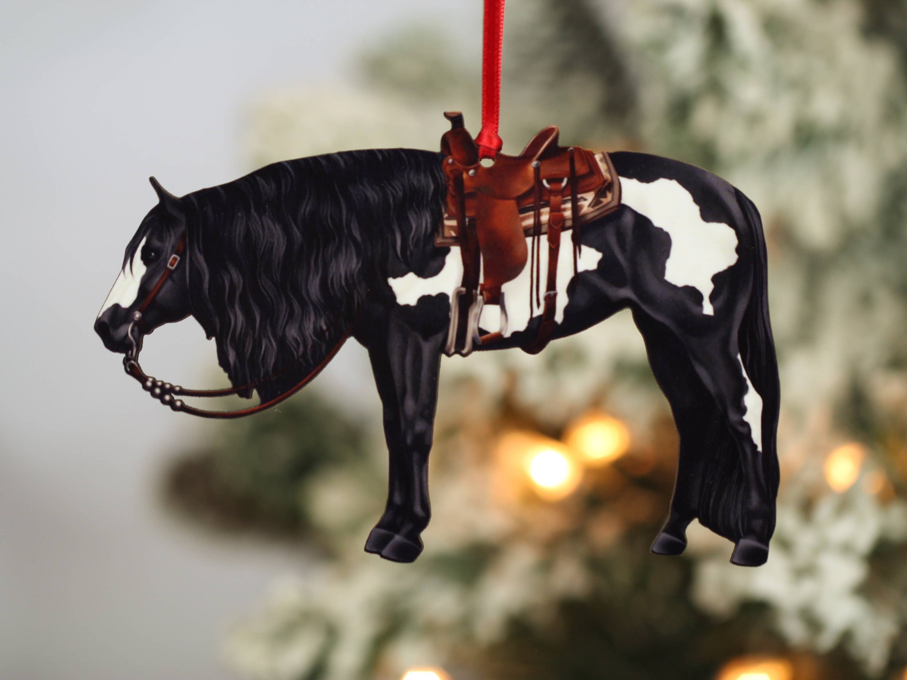 Black and white tobiano western Paint Horse ornament, handmade from composite wood, perfect for Christmas decor.