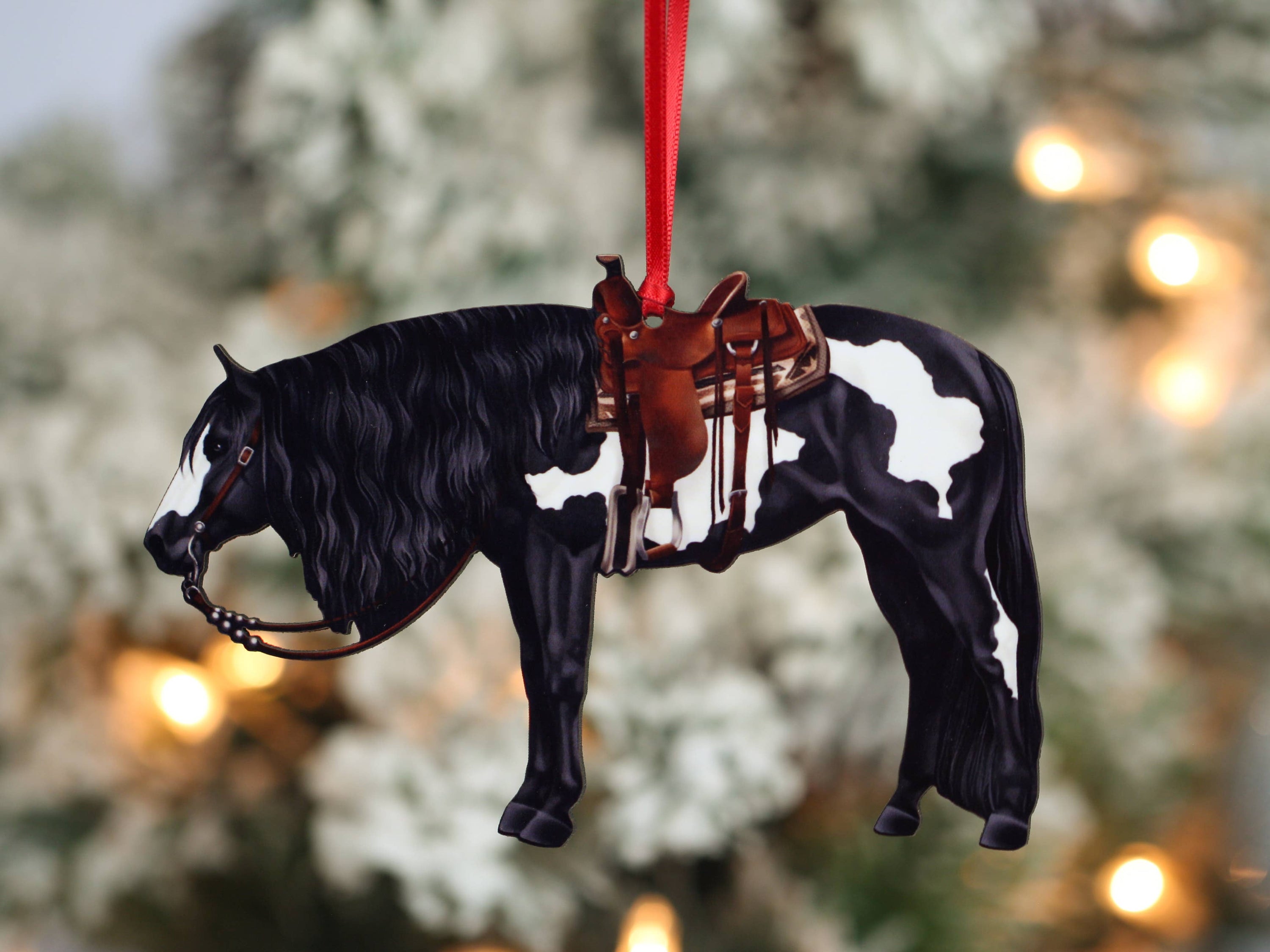 Black and white tobiano western Paint Horse ornament, handmade from composite wood, perfect for Christmas decor.
