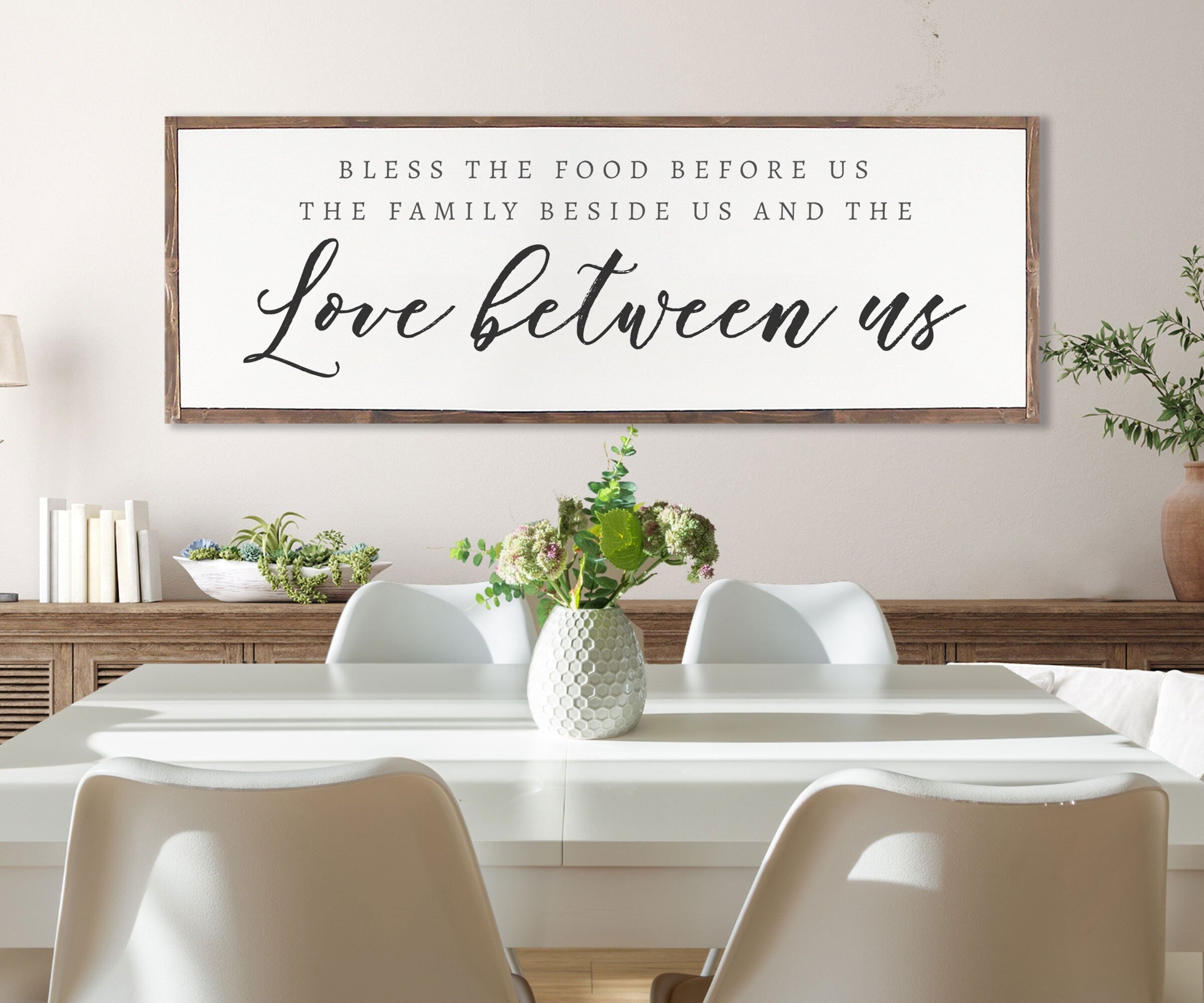 Rustic Bless the Food Before Us wood sign with Christian scripture, framed in a customizable stain color, perfect for dining room decor.