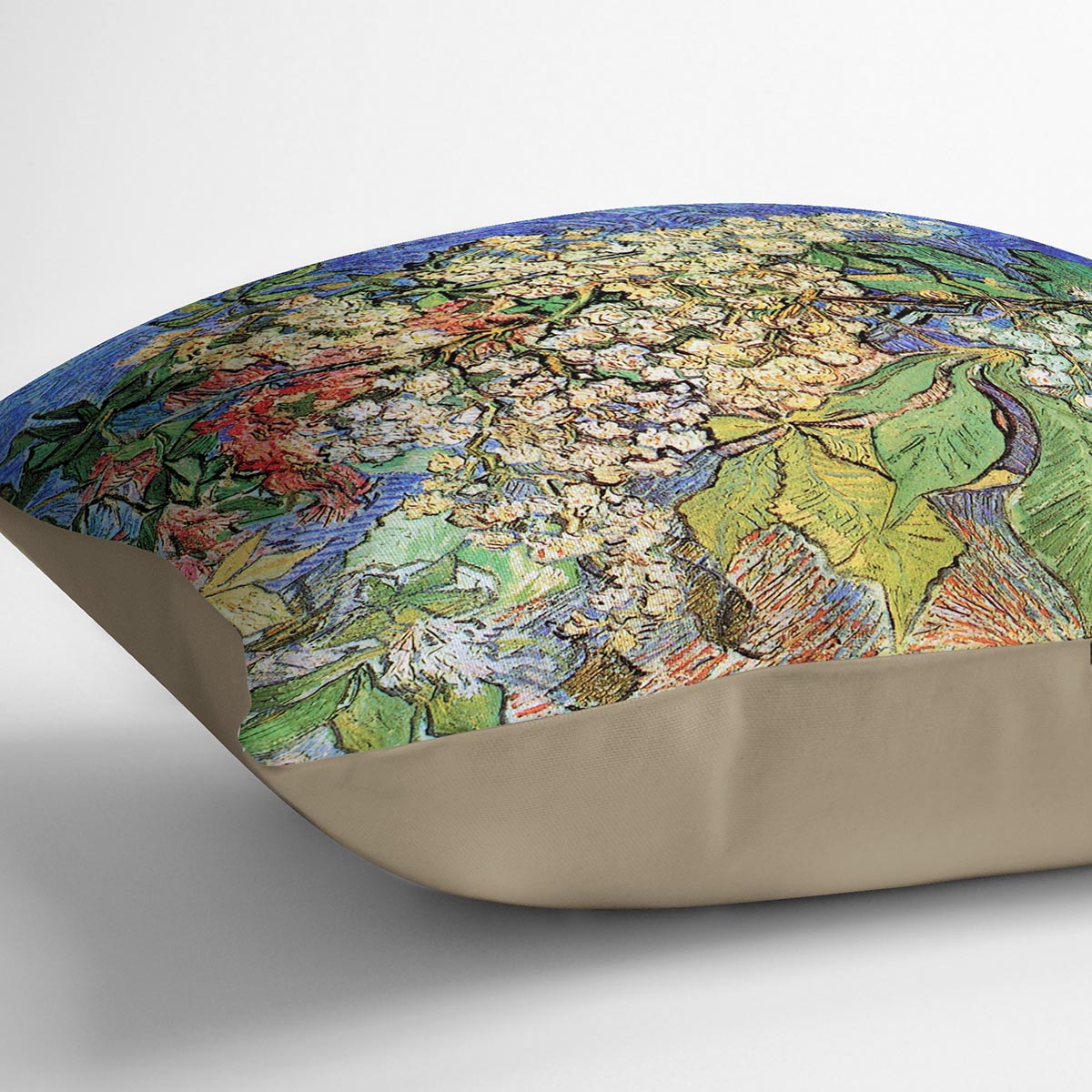 A vibrant cushion featuring Van Gogh's Blossoming Chestnut Branches design, made from luxurious vegan faux suede.