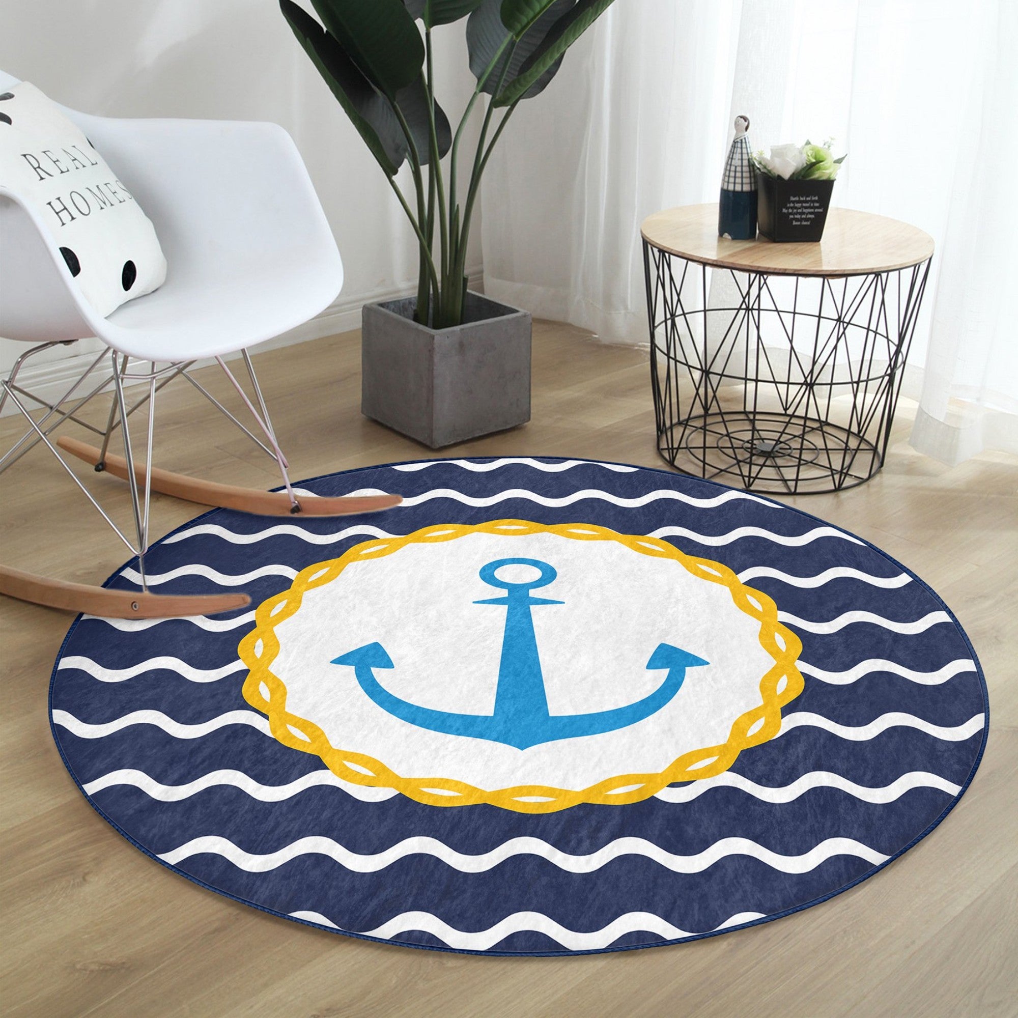 A round rug featuring a deep blue anchor pattern, perfect for marine-themed decor, showcasing its soft texture and vibrant colors.