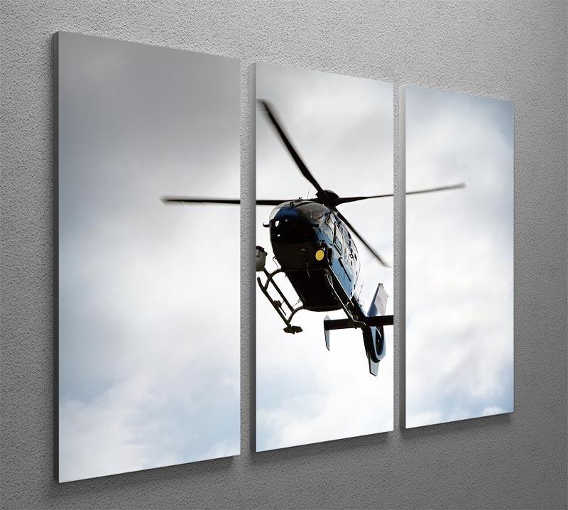 A blue and silver police helicopter depicted in a stunning 3-panel canvas art set, showcasing vibrant colors and dynamic design.