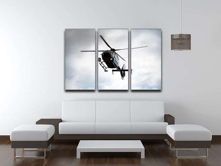 A blue and silver police helicopter depicted in a stunning 3-panel canvas art set, showcasing vibrant colors and dynamic design.
