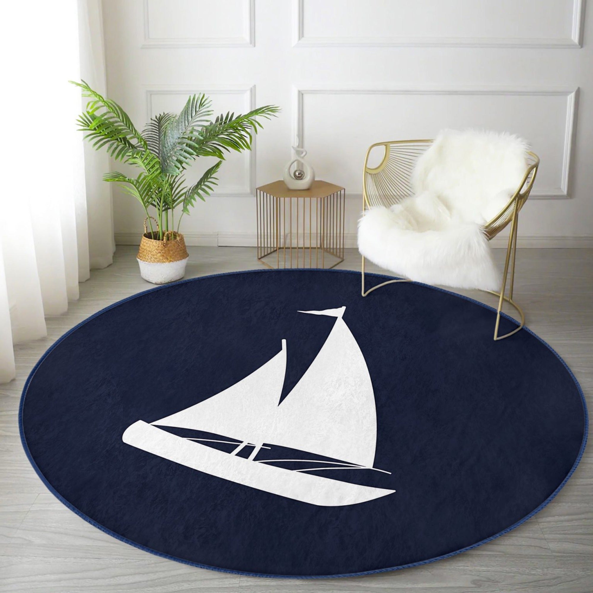 A round rug featuring a blue sail pattern, showcasing its soft velvet texture and vibrant colors, perfect for home decoration.