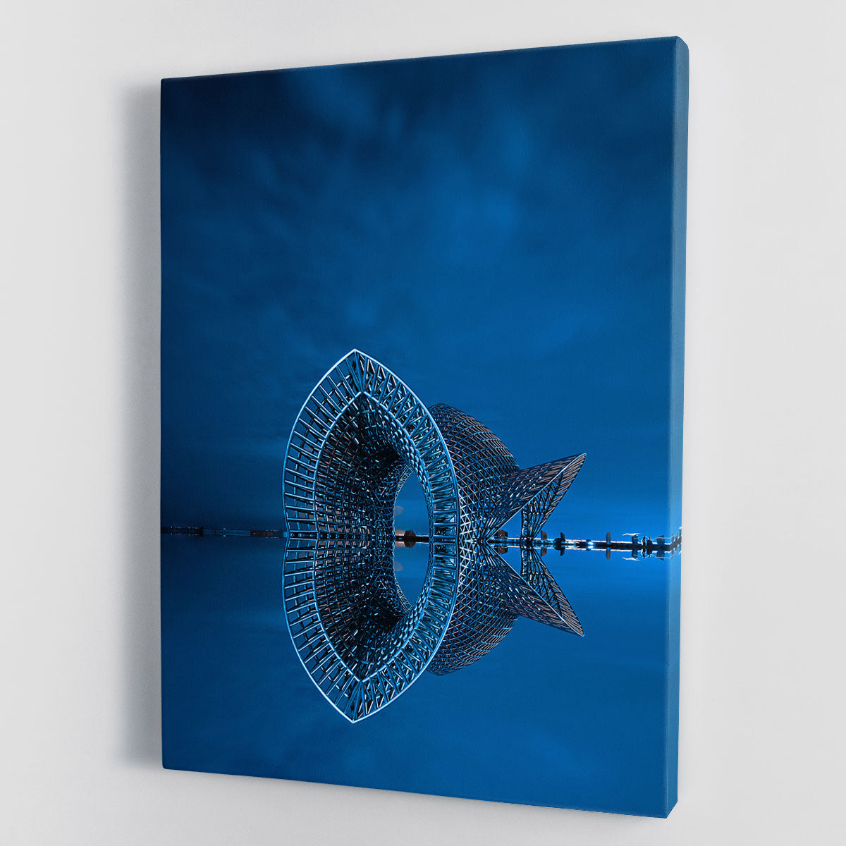 A beautiful canvas print featuring a blue sculpture reflected in the sea, showcasing vibrant colors and intricate details.