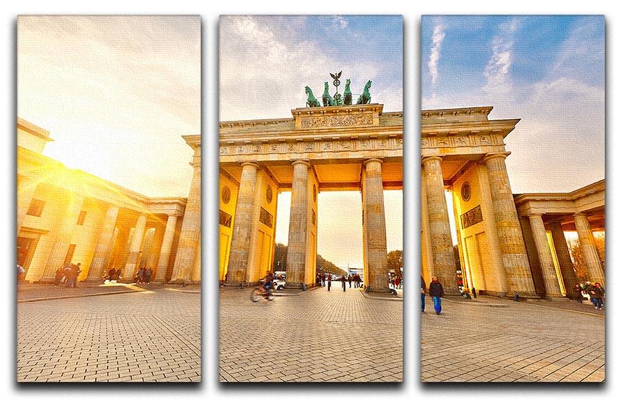 Brandenburg Gate at sunset depicted in a stunning 3-panel canvas print, showcasing vibrant colors and intricate details.