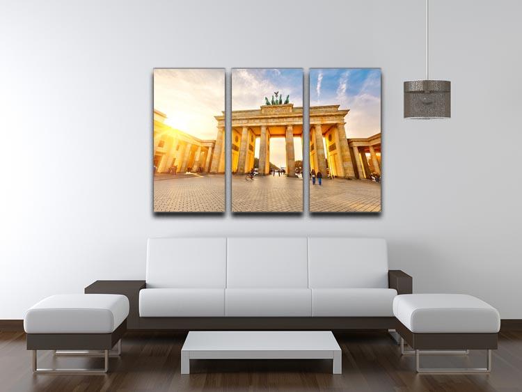 Brandenburg Gate at sunset depicted in a stunning 3-panel canvas print, showcasing vibrant colors and intricate details.