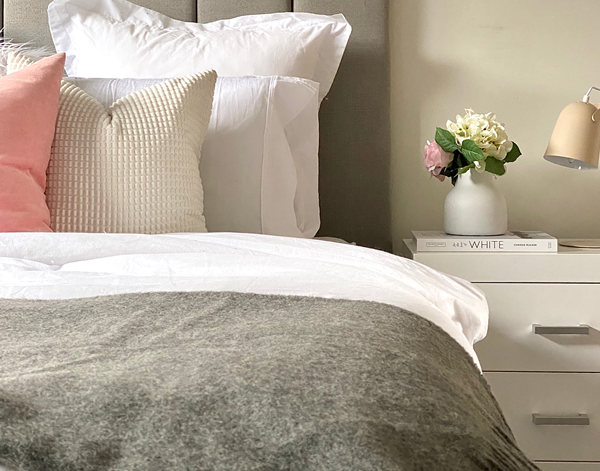 Brighton Throw blanket made from 100% New Zealand wool in a rich cherry color, showcasing its thick and cozy texture.