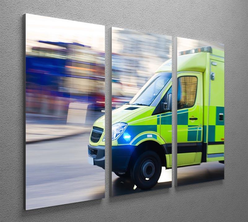 A dynamic 3-panel canvas print featuring a British ambulance in motion blur, showcasing vibrant colors and a captivating design.