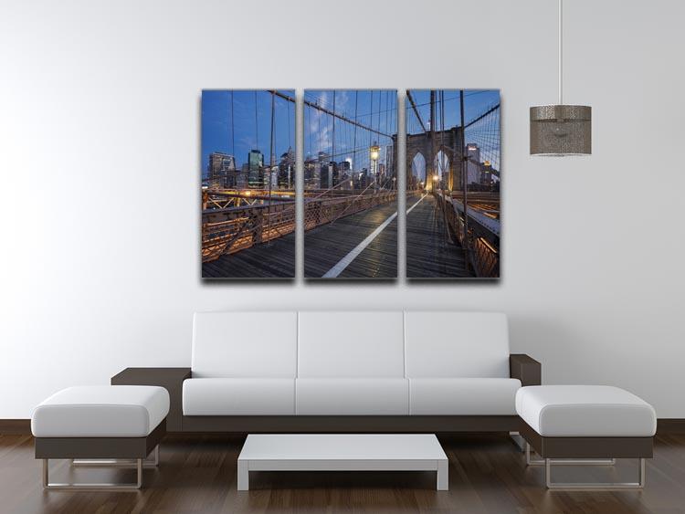 A stunning 3-panel canvas print of the Brooklyn Bridge at sunrise, showcasing vibrant colors and intricate details.