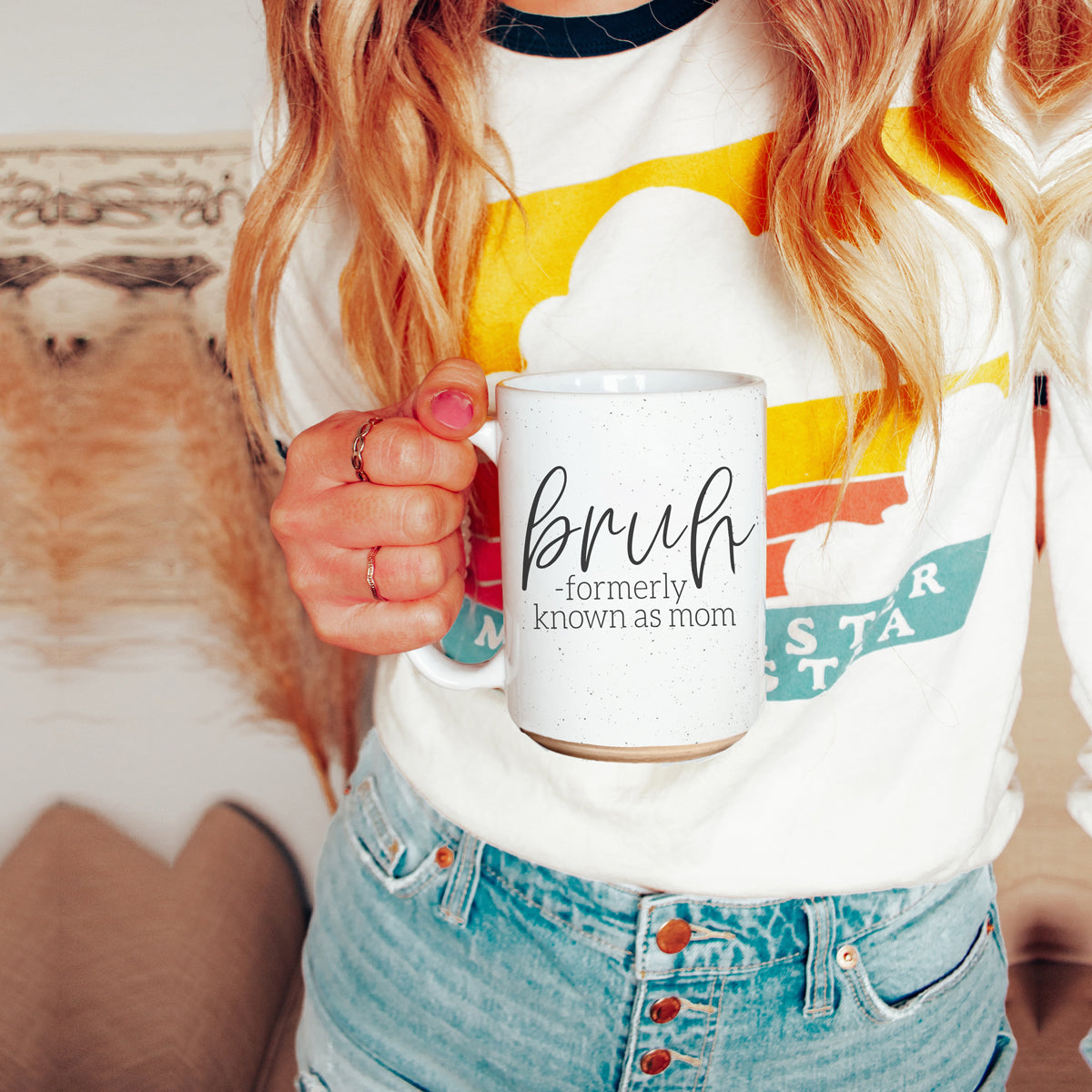 Bruh 16oz ceramic mug with humorous graphic design, off white color with dark speckles, perfect for coffee or tea.