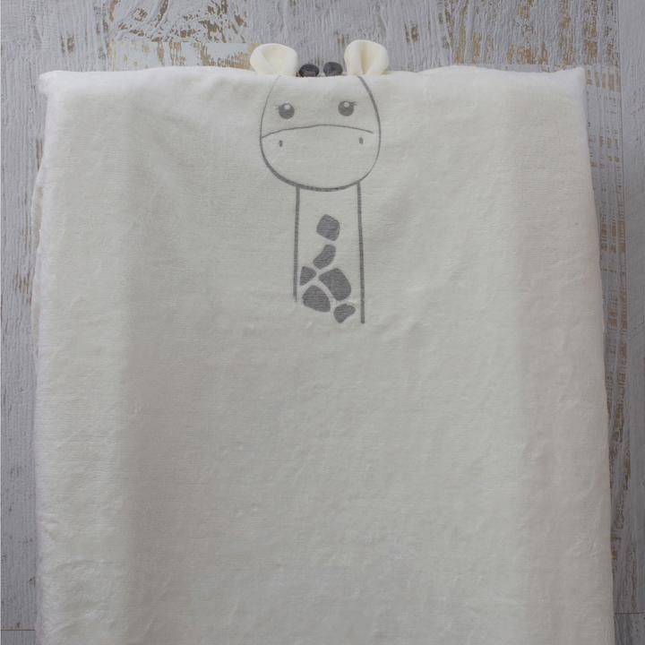 Bubba Blue Vanilla Playtime Change Mat Cover featuring a cute giraffe print with 3D ears and antennas, designed for nursery use.