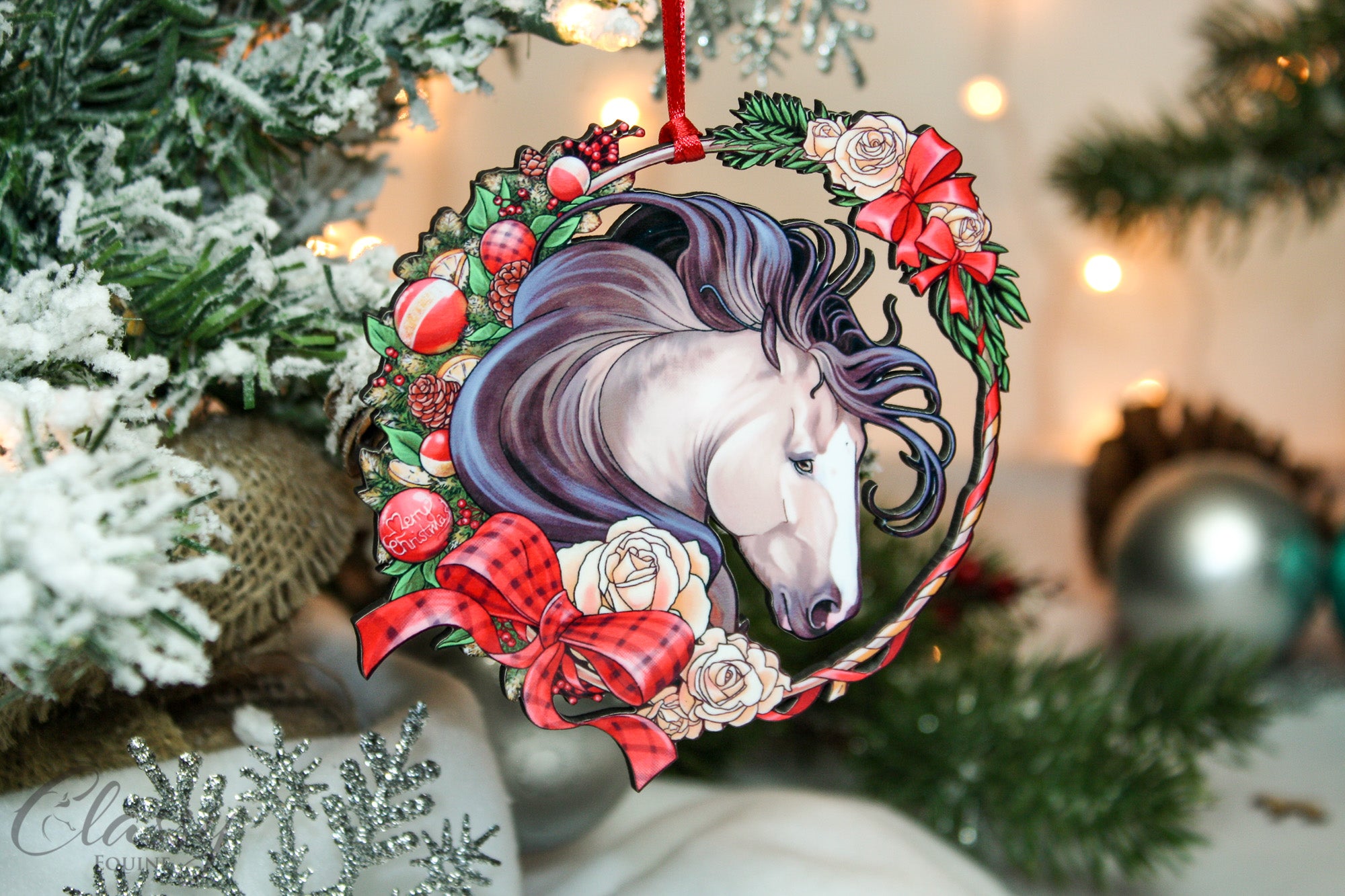 A beautifully crafted buckskin horse ornament in a festive wreath, made from composite wood, perfect for Christmas decor.