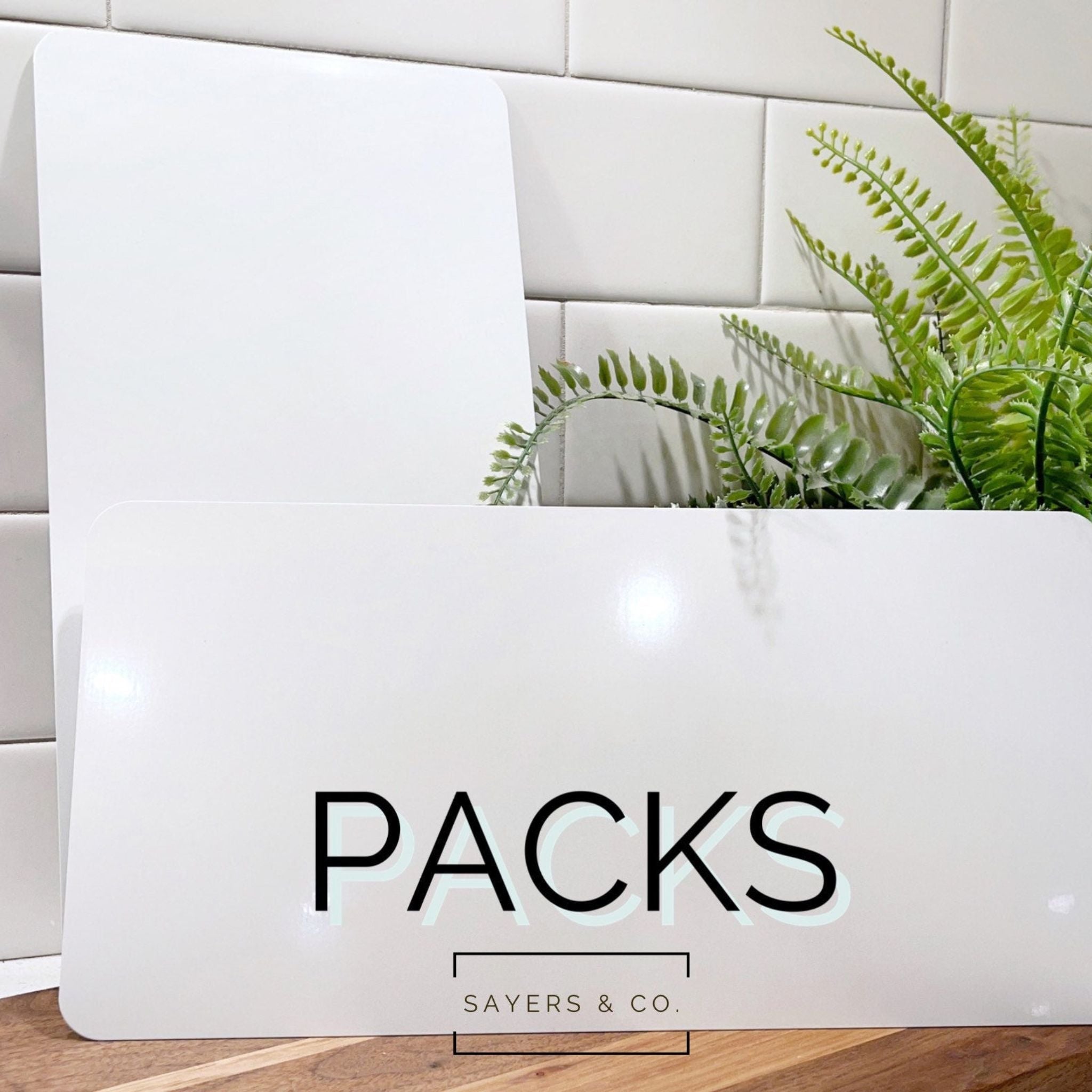 Bulk pack of 6” x 12” white sublimation sign blanks, ideal for crafting and personalized projects.