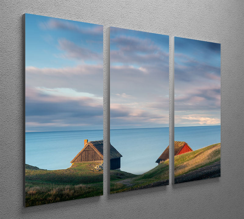 A beautiful 3-panel canvas print featuring serene cabin scenes, enhancing interior decor with elegance.