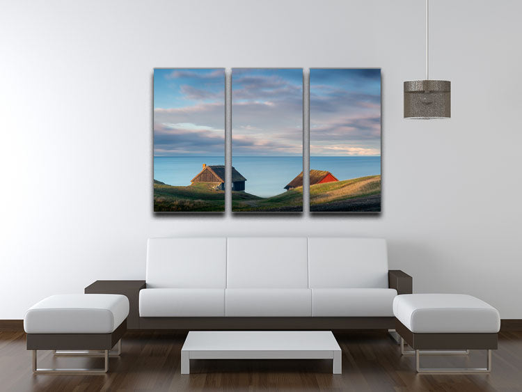 A beautiful 3-panel canvas print featuring serene cabin scenes, enhancing interior decor with elegance.