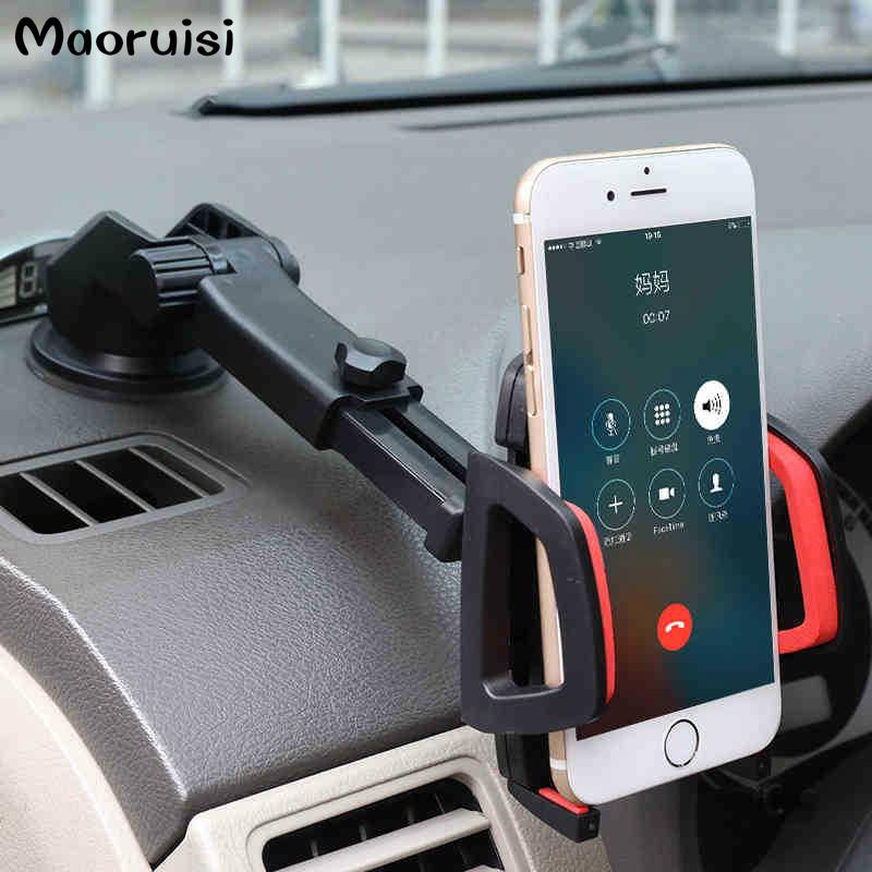 Car Phone Holder mounted on a dashboard, securely holding a smartphone for GPS navigation.