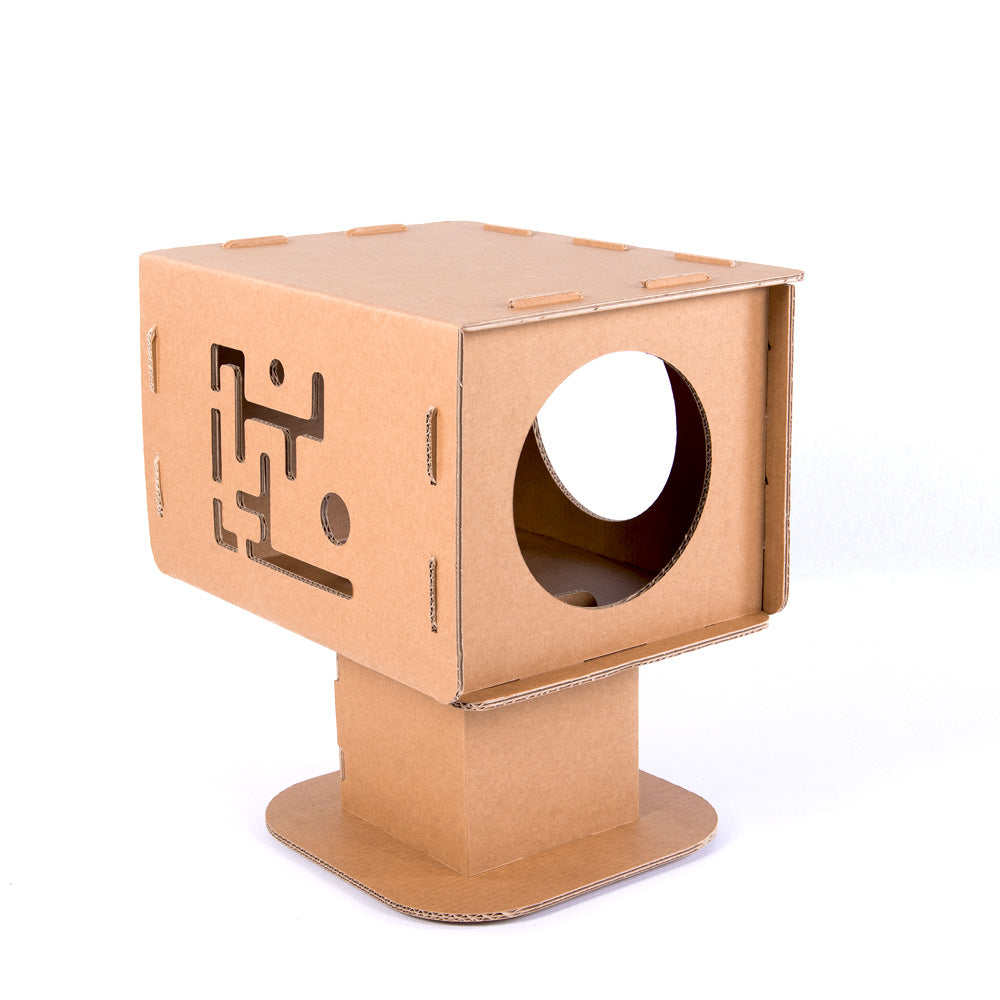 Cardboard Cat House TOM in beige color, featuring a reversible design for cats to play and explore, made from eco-friendly kraft corrugated cardboard.