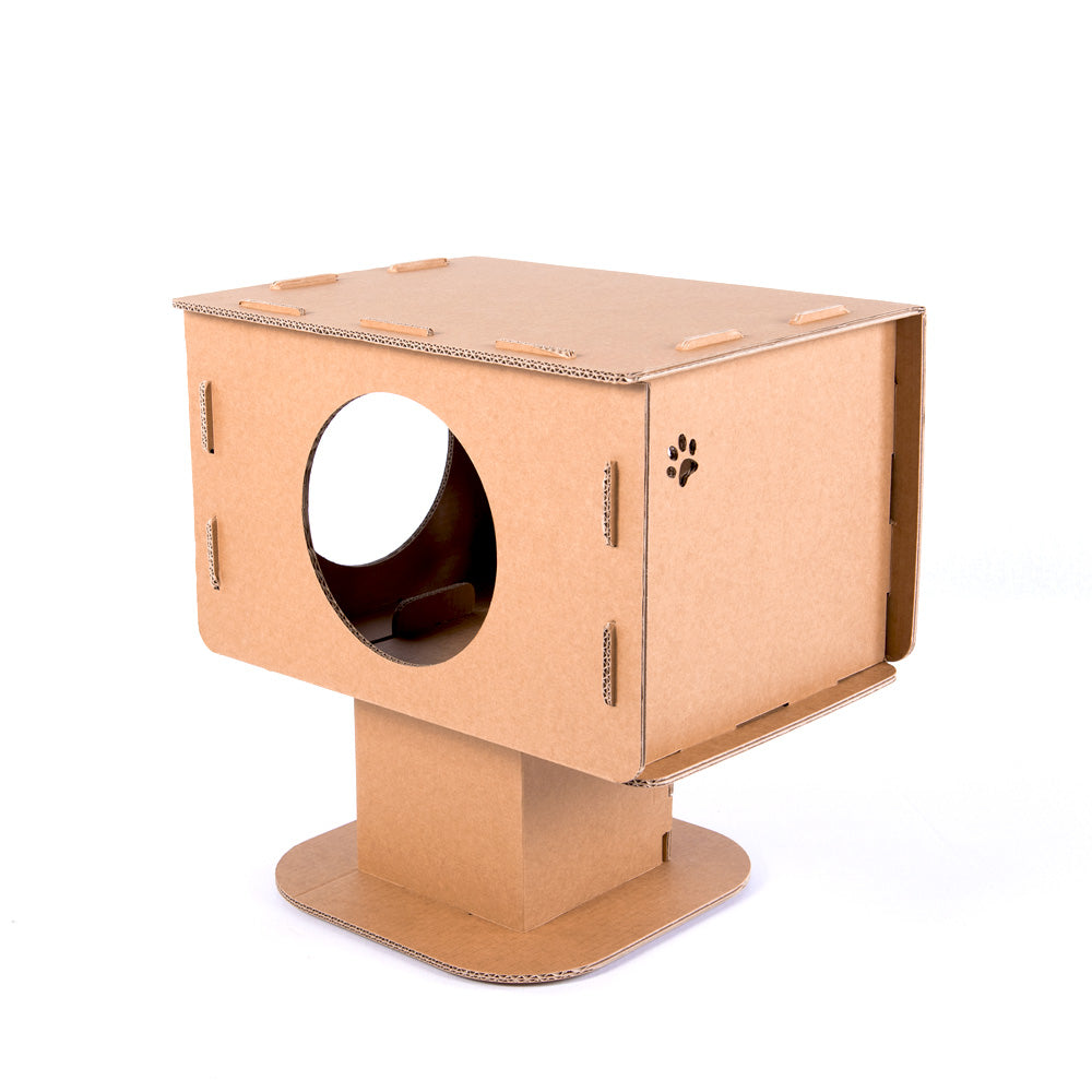 Cardboard Cat House TOM in beige color, featuring a reversible design for cats to play and explore, made from eco-friendly kraft corrugated cardboard.